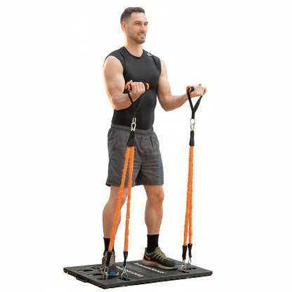 Flexora Portable Training System – man performing biceps curls with orange resistance bands on base platform on a white background