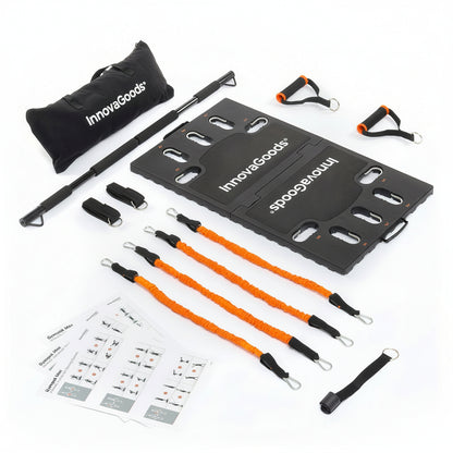 Flexora portable training system – black platform, orange resistance bands, handles and accessories laid out on a white background