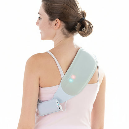 Flexora rechargeable wireless massage and heat belt on the shoulder and upper back 